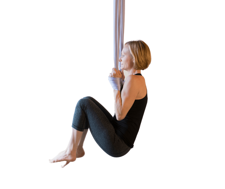 Premium Photo | Young woman in sportwear doing aerial fly yoga with blue  hammock in light gym concept pilates and fl
