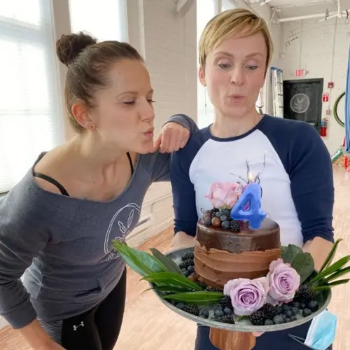 Earth and Aerial Yoga celebrates 4 years with owners Lora & Kat taking part in festivities; the company is offering free services all day on their May 17th anniversary.